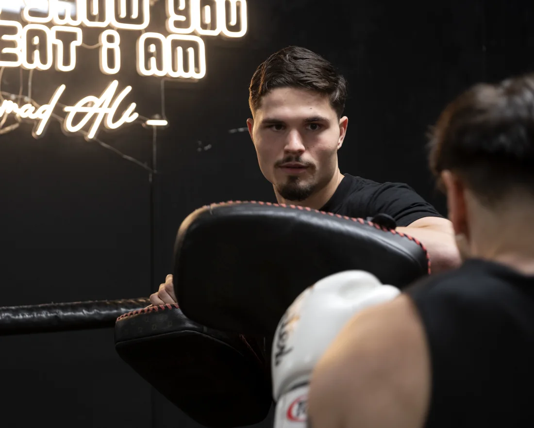 Casper Boekee with Thai pads in the ring at Patrick's Gym
